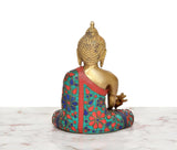 Back view brass Buddha statue, multicolor robe with ornate details