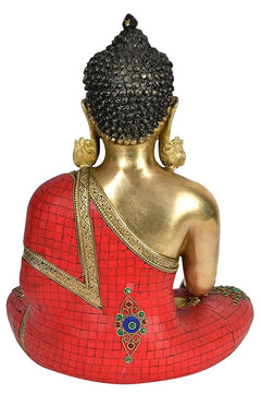 Back view of brass Buddha idol, red mosaic robe with ornate gold trim