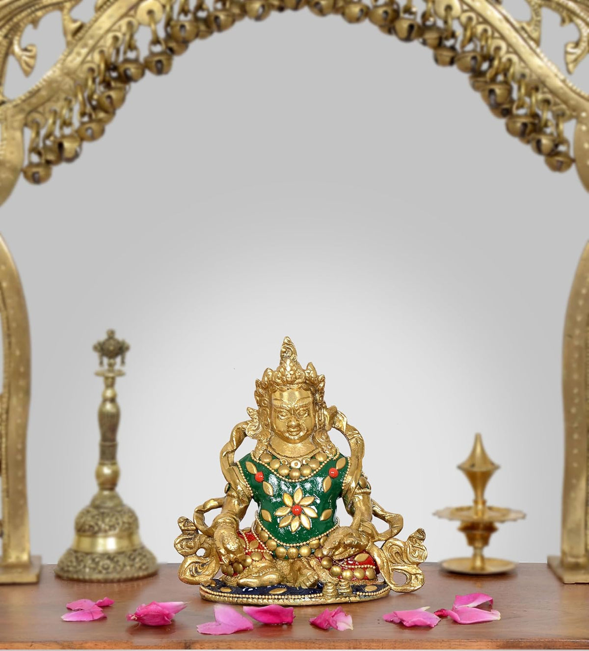 Antique brass Kubera seated statue with green decorated torso and gold details