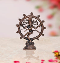 Copper Nataraja Shiva idol with circular halo, dancing pose, decorative home showpiece