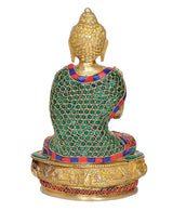 Back view brass Buddha statue with blue-green patterned robe and jewel trim