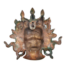 Mahakala wall hanging back view in bronze with green patina and hanging loops