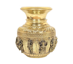 Brass kalash showpiece showing carved leaf patterns and side deity figures