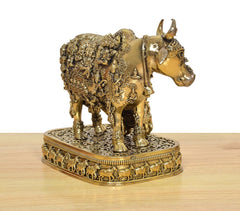 Rear side view of Kamdhenu cow murti with calf, textured pedestal with animal band