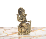 Brass Lord Vishnu seated on lotus, profile face with crown and arm accents