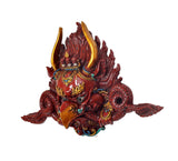 Garuda face wall mask statue side view, red face with gold flame horns