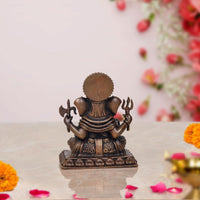 Copper Lord Ganpati murti, back view, textured body and pedestal base