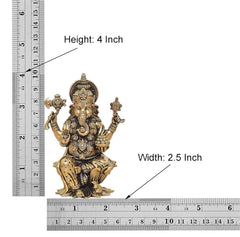 Lord Ganesha brass idol; height 4 inch and width 2.5 inch shown on measuring chart.