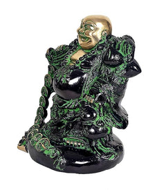 Gold and green laughing Buddha statue on base, side view with robe details