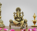Brass Ganesha idol on singhasan, 4-inch height, ornate crown and trunk