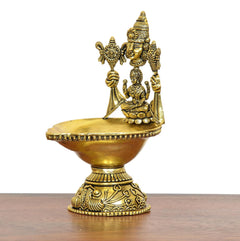 Brass Tirupati Balaji and Goddess Lakshmi diya, three-quarter side view