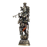Brass Krishna idol statue, detailed jewelry and flute-like instrument hand on base