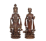 Resin Swami Narayan & Akshar Murti figurines, seated base with detailed floral feet