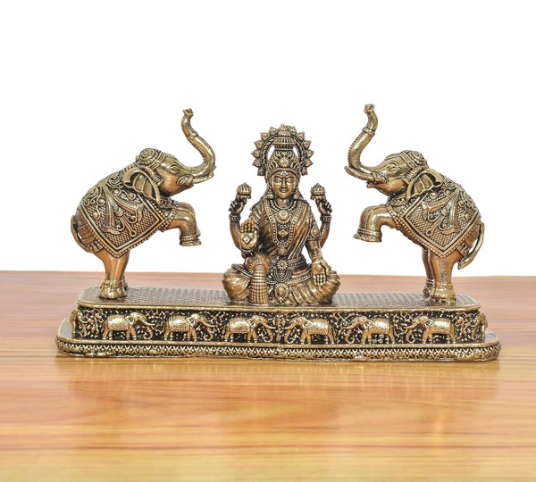 Superfine Brass Gaj Lakshmi Goddess Sitting Statue (Height 3.5 Inch) Study Setting