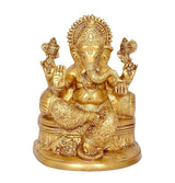 Gold-toned brass Ganesha idol statue, seated on round base, front view