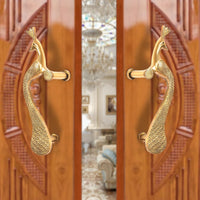 Brass peacock design door handle pair with lever grips and textured fan pattern