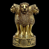 Brass Ashoka Stambh emblem memento, close-up lion figure on round wheel pedestal