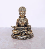 Brass Maa Annapurna murti, front view seated with ornate crown and patterned dress
