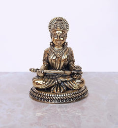 Brass Maa Annapurna murti, front view seated with ornate crown and patterned dress
