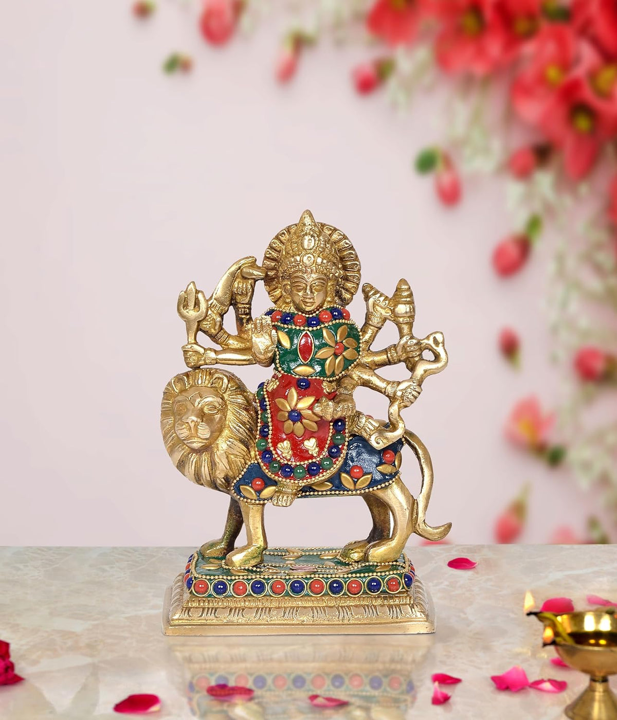 Brass Durga Maa statue on lion idol, blue-red decorative dress, seated on pedestal