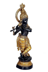 Krishna idol bronce dorado y azul oscuro, perfil lateral con tridente frente y atuendo