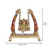 Brass Ganesha swing showpiece, height 10 in; red jeweled pillars with chains