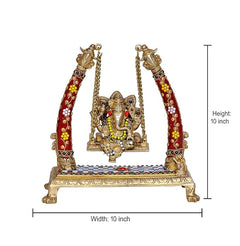Brass Ganesha swing showpiece, height 10 in; red jeweled pillars with chains