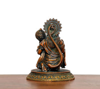 Brass Hanuman JI idol rear view, detailed crown and draped ornaments, seated on base