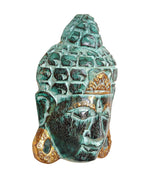 Wooden Buddha mask wall hanging, teal relief face with gold swirls at the sides