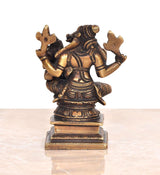 Brass Varaha Lakshmi statue idol from back angle, ornate details on base