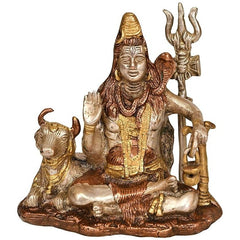 Brass Shiva seated with Nandi figurine, multi-tone detailing on robe and face