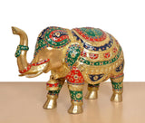 Brass elephant figurine side view, raised trunk and ornate multicolor adornments on body