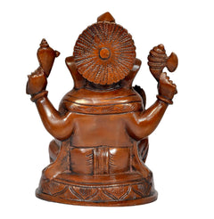 Ganesha idol statue, back view with carved halo and raised arms, bronze finish