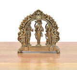 Brass ram darbar statue, back view, carved arch frame with three standing figures