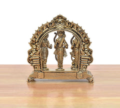 Brass ram darbar statue, back view, carved arch frame with three standing figures