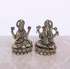 Brass Lakshmi & Ganesha idols, detailed crowns and jewelry, seated on lotus base