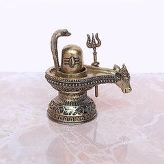 Bronze-style Shiva ling murti with Nandi head and trident, detailed deity figurine