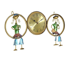 Three-piece iron wall hanging: gold clock center with two green musician figures in blue skirts