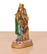 Resin Radha Krishna idol—side view of flute-playing Radha-Krishna pair, lotus base
