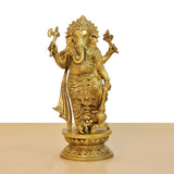 Brass standing Lord Ganesha figurine with detailed garments and trident-style hands