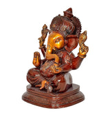 Ganesha idol statue side view, detailed halo crown and raised hands