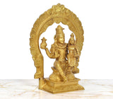 Brass Shiva and Parvati figurine with intricate jewelry and seated pose, front-right angle.