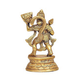 Brass Hanuman idol with raised arms and patterned clothing on circular pedestal