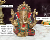Brass Ganpati Bappa murti, multicolor decorated crown and jewelry, seated pose