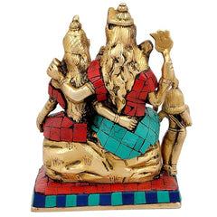 Brass Shiv Parivar murti side view, raised hands and faces, red robe, teal tiled skirt