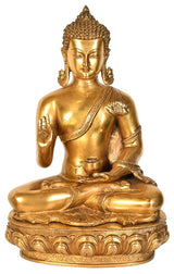 Brass Buddha abhaya mudra statue, serene face and raised right palm