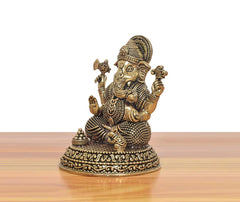 Superfine Brass Ganesh statue, side view showing seated posture and jewelry