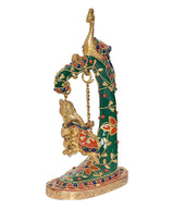 Rear view brass peacock swing Ganesha statue with enamel pattern and gold frame
