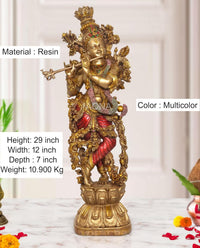 AONA Krishna-Flötenfigur aus Resin, goldene Ornamente, rote und blaue Akzente