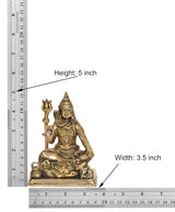 Brass Shiva sculpture with dimensions: height 5 in, width 3.5 in, seated with trident